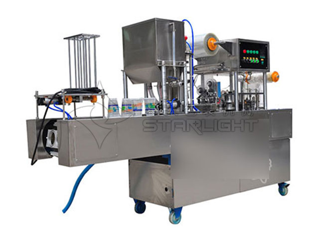星火盒裝米酒食品全自動(dòng)封口機(jī)設(shè)備展示